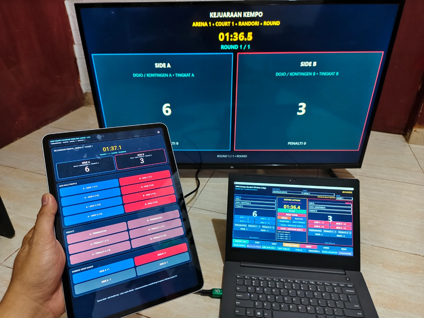 Papan skor Kempo Randori Juri WiFi digunakan dengan laptop operator panel juri HP dan TV
