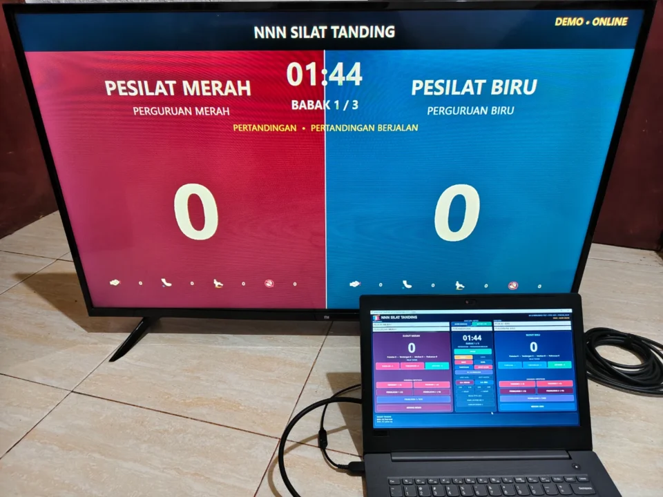 Aplikasi papan skor Pencak Silat Tanding dengan operator dan tampilan TV