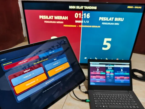Sistem juri WiFi Pencak Silat dengan laptop operator panel juri dan scoreboard TV
